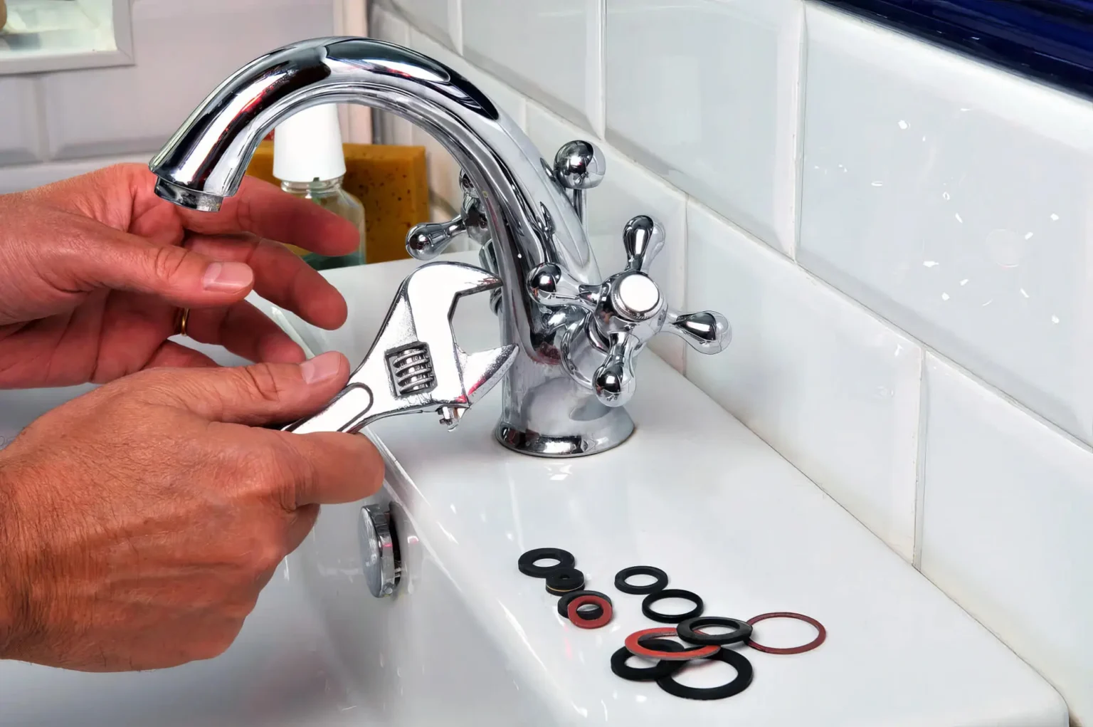 Plumber maintaining a bathroom faucet in Temple City